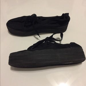 Black platform sneakers